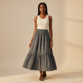 Nigerian girl wearing charcoal grey tiered midi skirt - front view