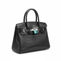 Ghost mannequin view of black croc-embossed structured tote bag with silver hardware