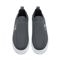 Straight-on charcoal slip-on sneakers with curved toe stitching and white soles
