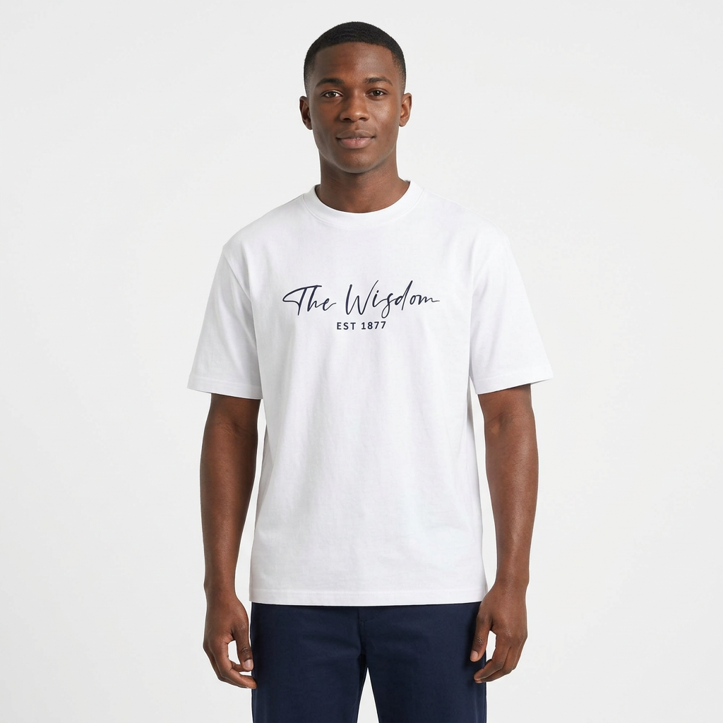 Nigerian male model wearing a white script-graphic T-shirt on white