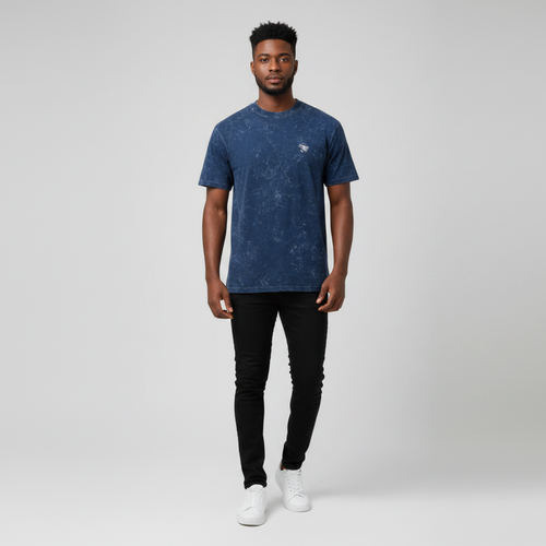 Young Nigerian male wearing acid wash navy marble texture crew neck tee with silver logo