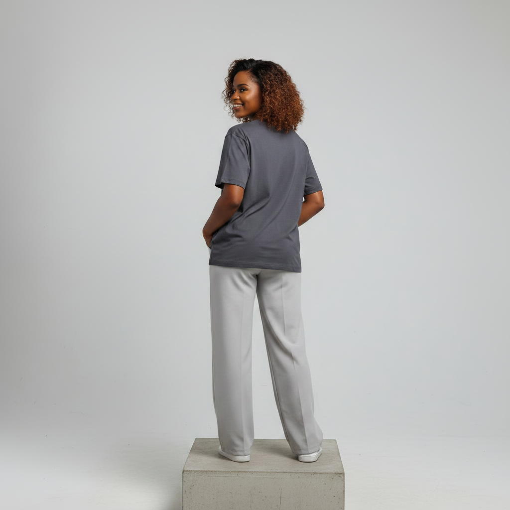 Nigerian female model back view wearing plain charcoal grey T-shirt - consistent model