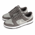 Pair of grey-taupe panelled low-top sneakers on white