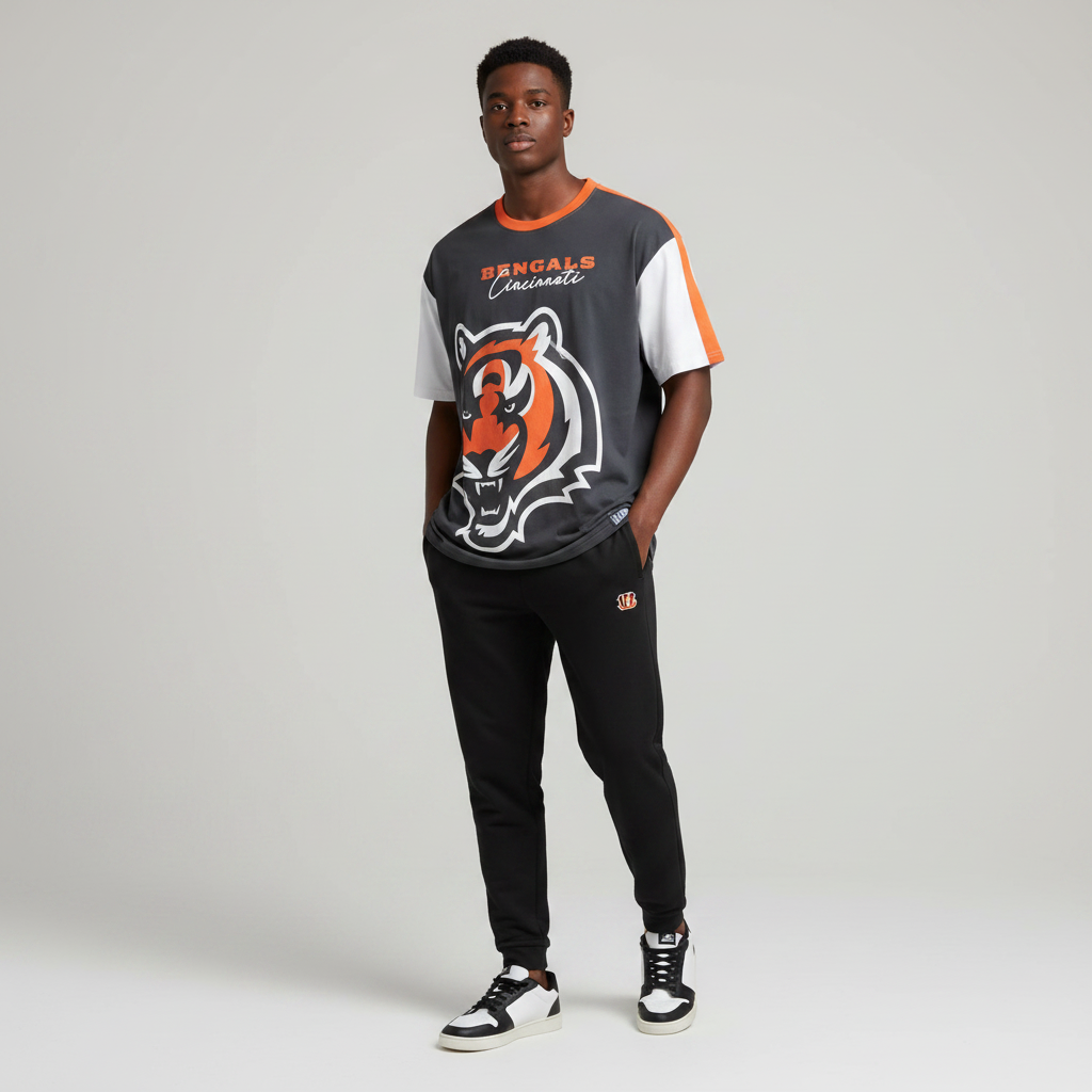 Young Nigerian male wearing charcoal grey NFL Cincinnati Bengals tiger graphic tee