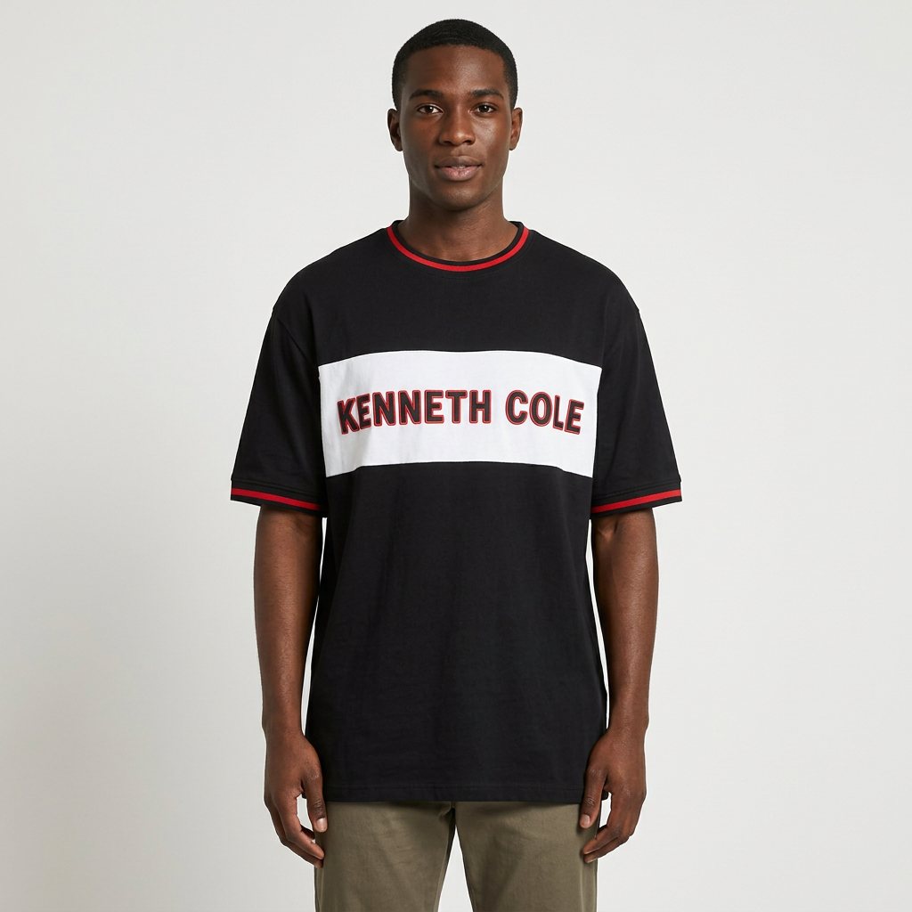 Model wearing black chest-band T-shirt with red trim