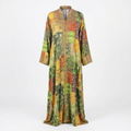 Green yellow and rust patchwork-print embellished abaya on an invisible mannequin