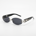 Rimless dark smoke sunglasses with silver-tone link temples on white