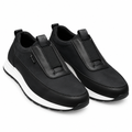 Pair of black panelled slip-on shoes on white