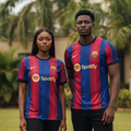 Nigerian female and male models wearing red and blue vertical stripe football jersey