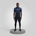 Nigerian male model wearing black blue feather graphic football jersey on concrete plinth