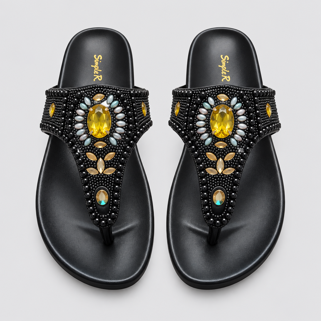 Pair of black beaded thong sandals with yellow stone details