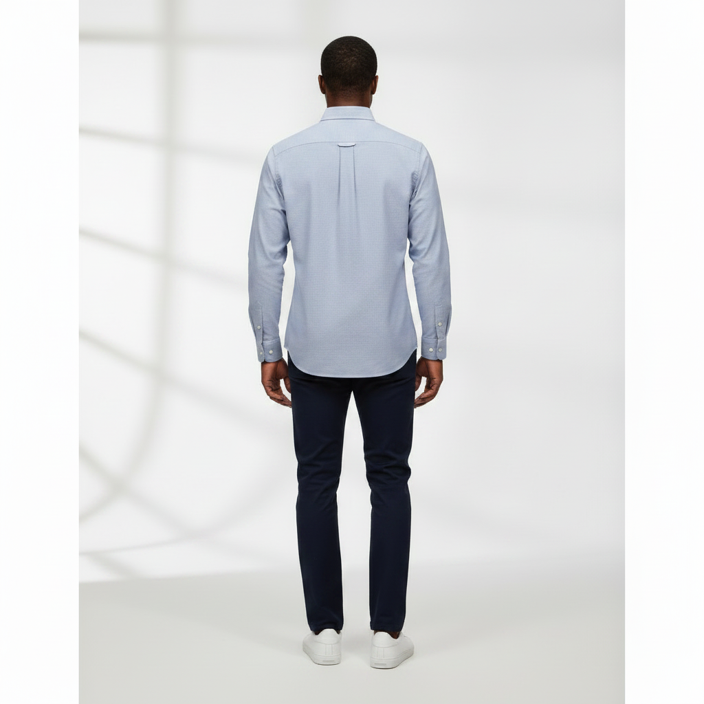 Nigerian adult male model wearing Light Blue Oxford Long Sleeve Shirt – Back View