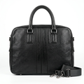 Black pebbled laptop bag with twin centre strips rounded handles and woven strap on white