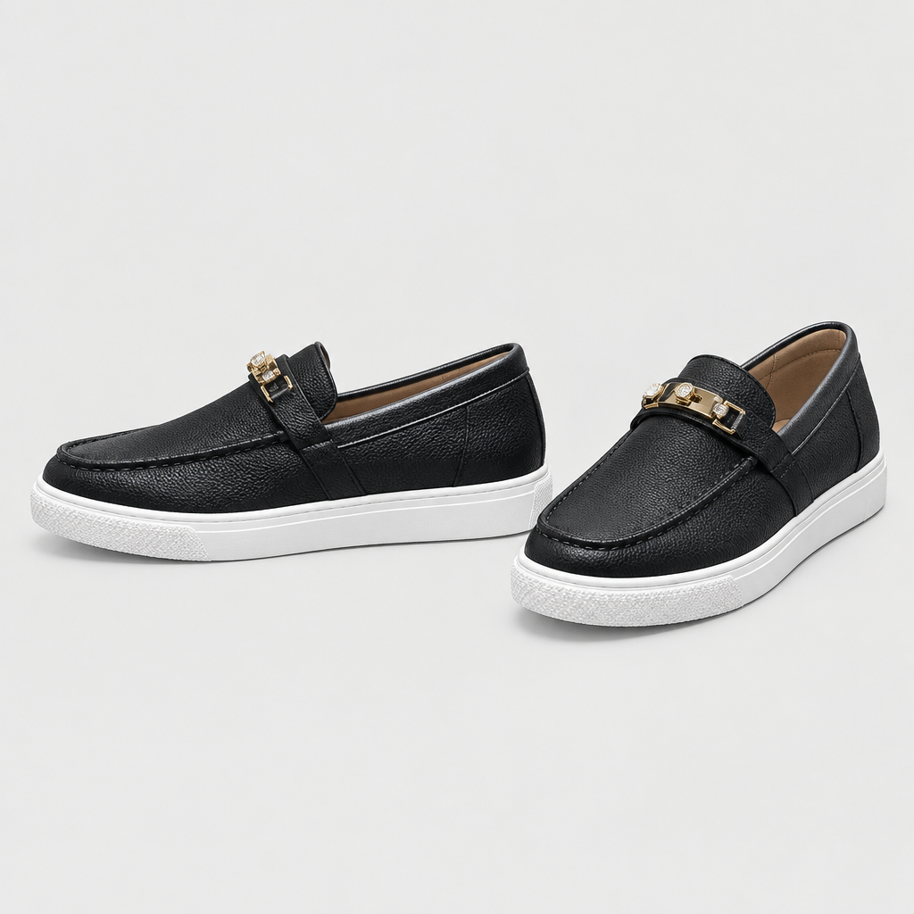 Black pebbled slip-on loafers with gold-tone vamp detail