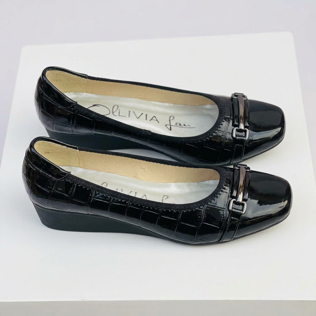 Matching black square-toe bar-detail wedge shoes