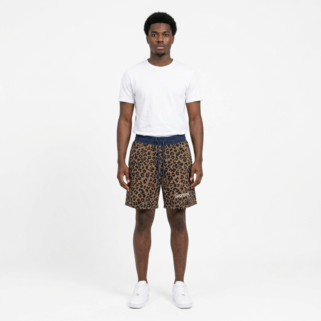 Full-body adult Black man wearing brown leopard-print drawstring shorts