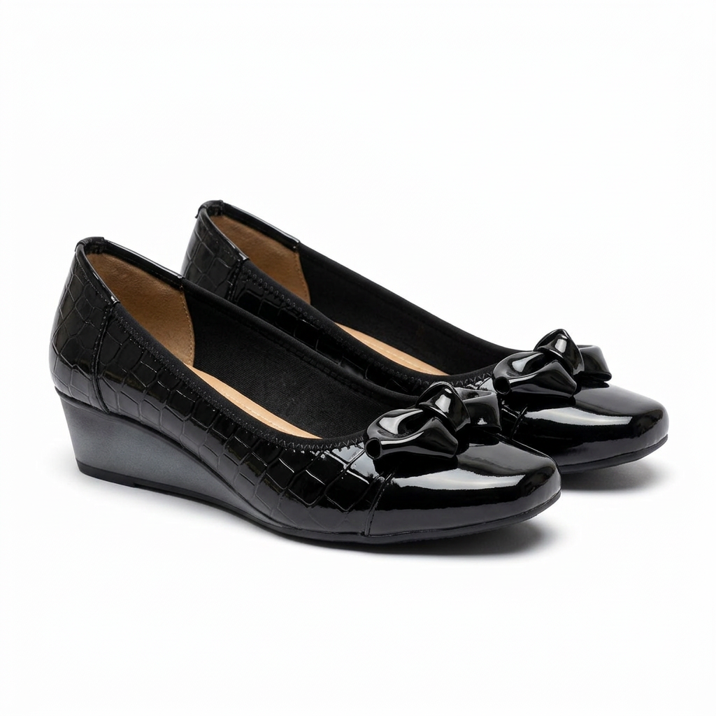 Matching black glossy sculpted-bow wedge shoes