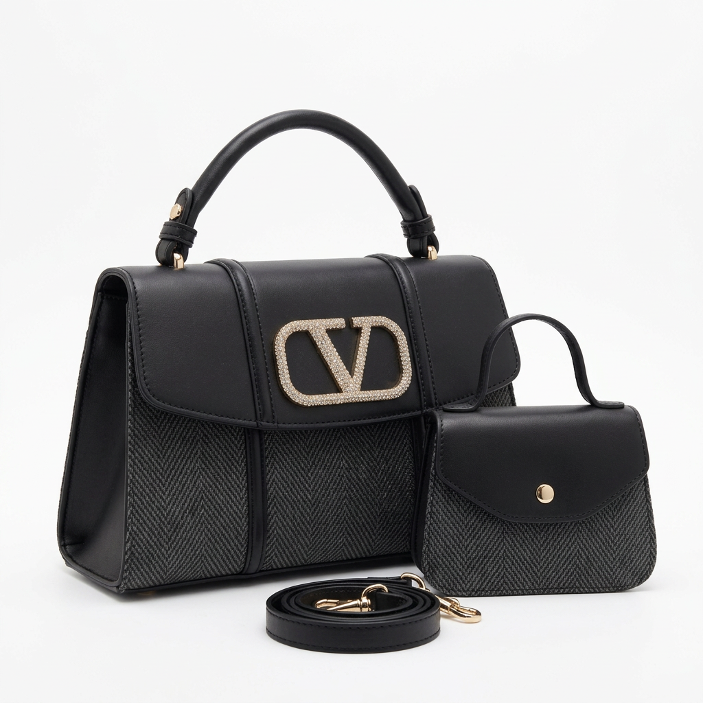 Black patterned-panel top-handle handbag with sparkling ornament beside smaller button-flap bag and strap
