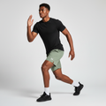 Model Shot – Light Olive Green Sports Shorts (Studio)