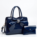 Navy bow handbag studio preview