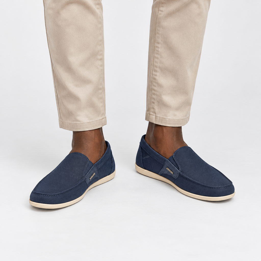 Navy slip-on shoes on model