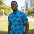 STEEZU Electric Azure blue polo shirt with black floral print, short sleeves, and collared neckline. Breathable fabric.