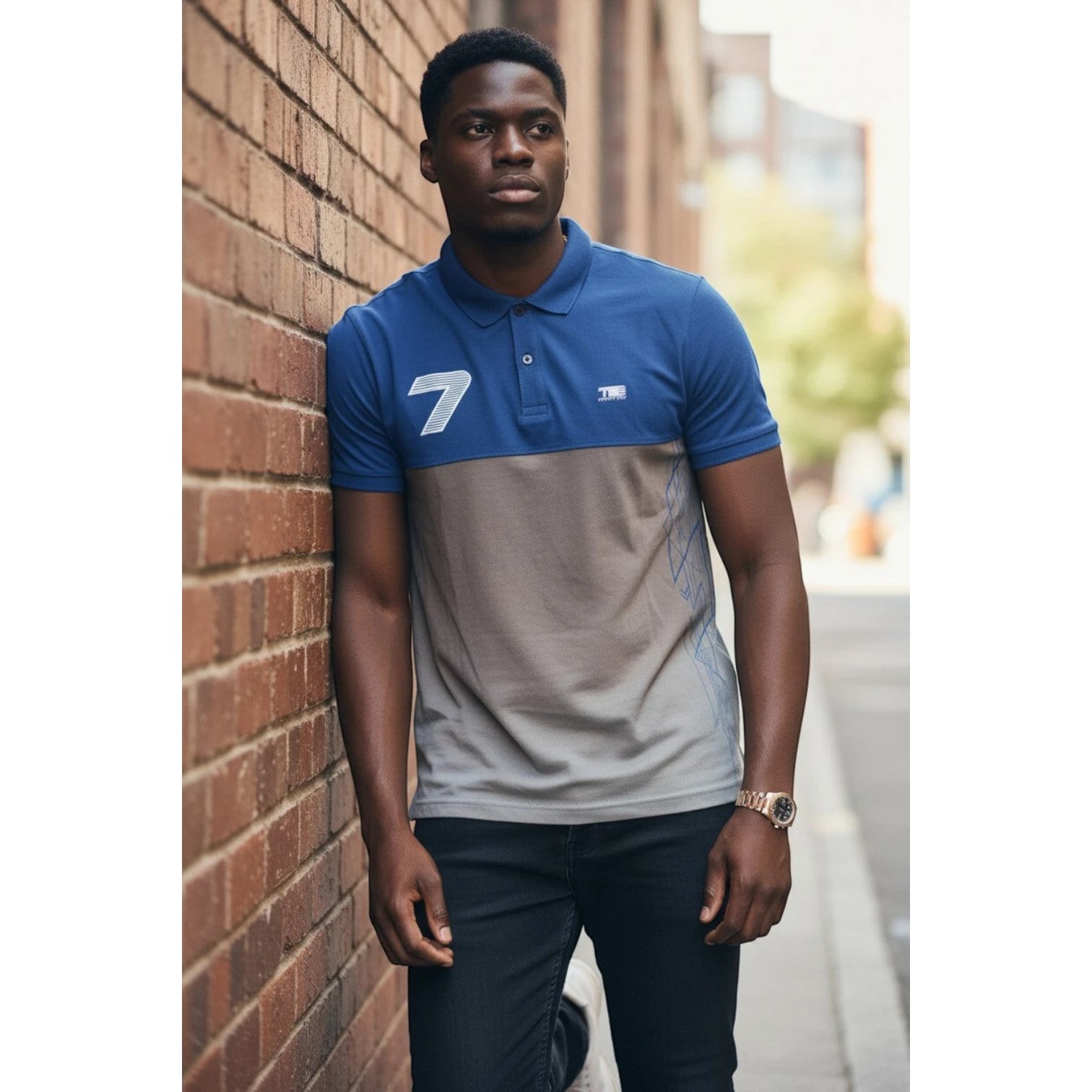 STEEZU men's dual-panel polo shirt in blue and grey with a large white '7' graphic and geometric print.