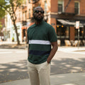 STEEZU forest green, white, and navy multi-block short-sleeve polo shirt with a logo on the chest.