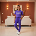 STEEZU girls' royal purple polka-dot co-ord set with pearl "Love Is Good" graphic crop tee and joggers.