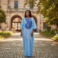 STEEZU light blue lace kaftan dress with sunburst rhinestone embellishment on chest and wide sleeves.