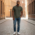 STEEZU military green polo shirt with yellow piping on collar and sleeves. Embroidered chest detail.