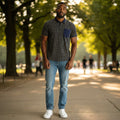 STEEZU navy blue polo shirt with gold geometric pattern, navy chest pocket, and gold piping on collar and cuffs. Athletic fit.