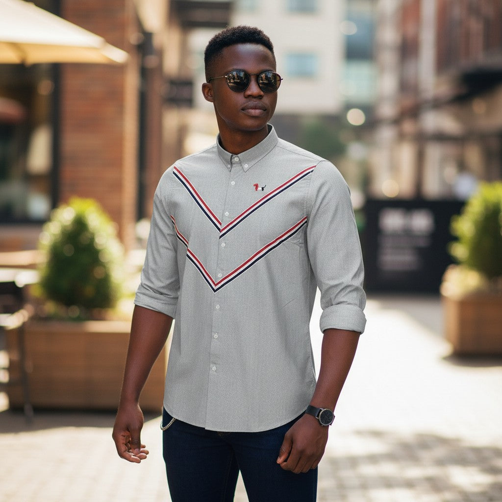 STEEZU steel grey Oxford long-sleeve shirt with red, white, and navy chevron stripe and embroidered dog motif. Button-down collar.