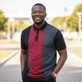 STEEZU Tri-Tone Horizon Polo shirt with navy, red, and charcoal panels. Short sleeves, collared neck with button placket.