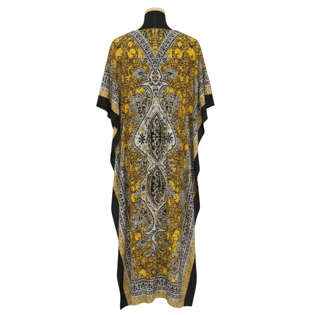 STEEZU yellow maxi kaftan dress with black, white, and yellow paisley print, V-neckline, and flowing silhouette.