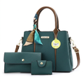 Teal scarf-handle handbag studio preview